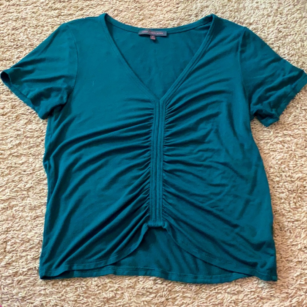 Beautiful color. Cute ruche detailing.